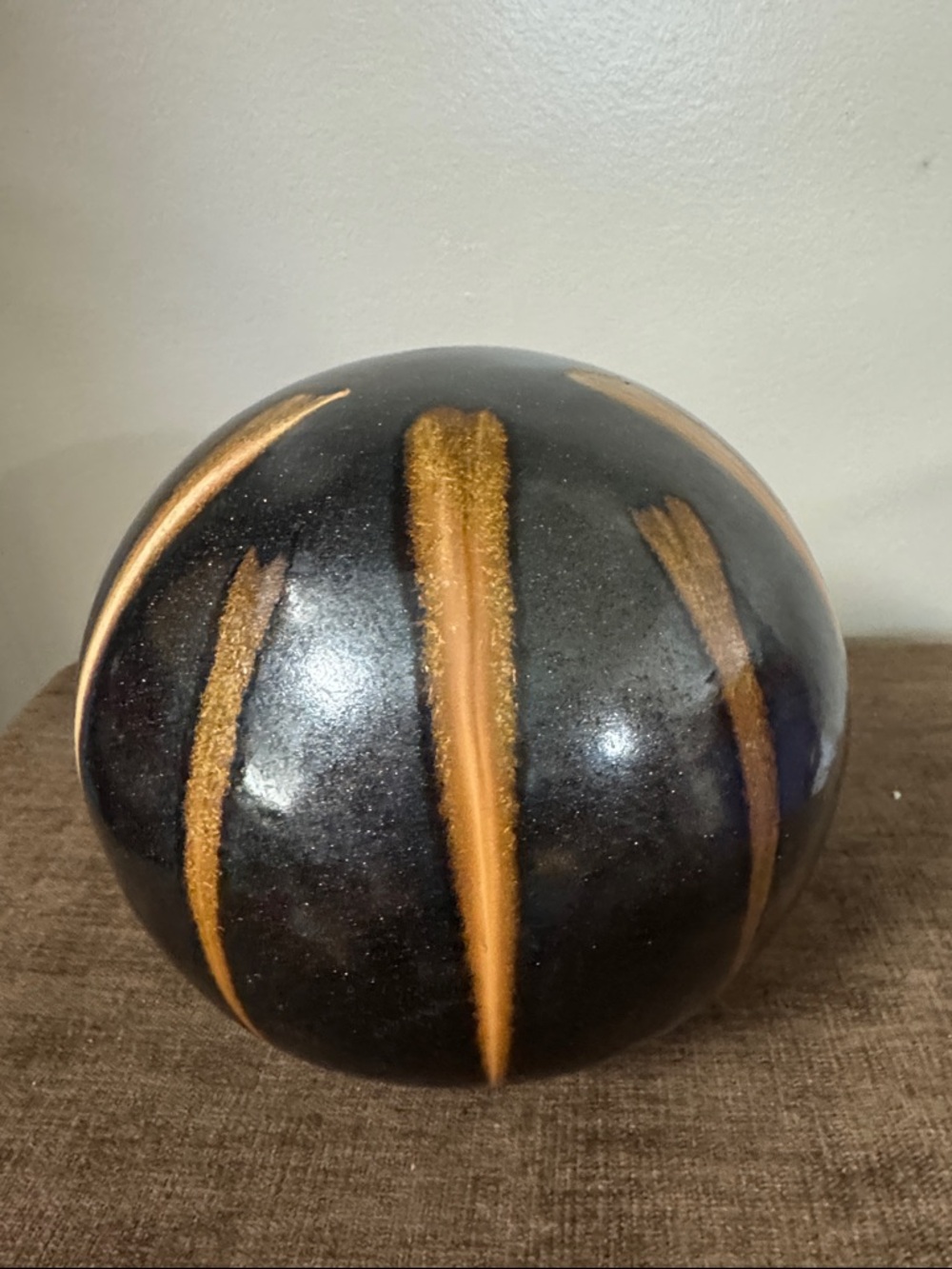 Better Homes And Gardens Black Ceramic Sphere with Gold Brushstroke Detail